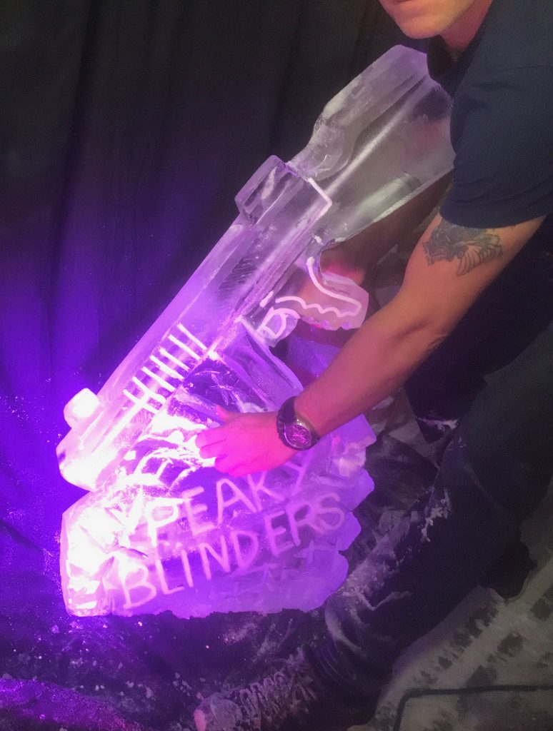 Glacier Ice - Ice Box - Funky Ice - Ice Creations - Peaky Blinders Tommy Gun Luge - Thompson Machine Gun - Tommy Gun - Peaky Blinders - Tommy Gun Vodka Luge - Tommy Gun Ice Sculpture - Glacial Ice - Ice Box - Vodka Luge - Vodka Ice Luge - Ice Luge - Ice Sculpture - Party Ice Luge - Ice Carving - Ice Carving Sculpture | Ice Agency