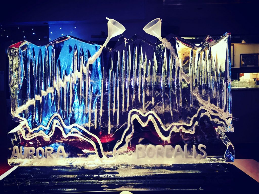Norther Lights Vodka Ice Luge Ice Sculpture for His Dark Materials Theme Party Aurora Borealis ice sculpture - swedish ice luge - northern lights party - northern lights theme - His Dark Materials - Philip Pullman - The Golden Compass - Golden Compass theme - The Amber Spyglass - Lyra - Magisterium - daemon - lord asriel - marisa coulter - Lord Carlo Boreal - Iorek Bynison - Serafina Pekkala - Ice Luge - Vodka Luge - Ice Carving Sculpture - christmas market ice sculpture - christmas market ideas - christmas market ice display - christmas market ice show - christmas party ideas - christmas ice luge - christmas ice sculpture - xmas party ideas - xmas ice luge - xmas vodka luge - Birthday ideas - birthday ice luge - Vodka Luge - Vodka Ice Luge - Ice Luge - Ice Sculpture - Party Ice Luge - Ice Carving - Ice Carving Sculpture - surrey ice luge - sussex ice luge - london ice luge - party ice luge - kent ice luge - essex ice luge - watford ice luge - Birthday ideas - birthday ice luge - Vodka Luge - Vodka Ice Luge - Ice Luge - Ice Sculpture - Party Ice Luge - Ice Carving - Ice Carving Sculpture - Glacier Ice - Ice Box - Funky Ice - Ice Creations - | Ice Agency