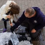 Surrey Christmas Market Live Ice Sculpture Carving Display in Kingston