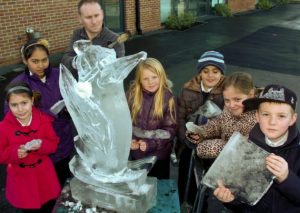 Live Ice Sculpture Carving Display for Fire and Ice Theme at Sussex, Surrey and Kent Schools