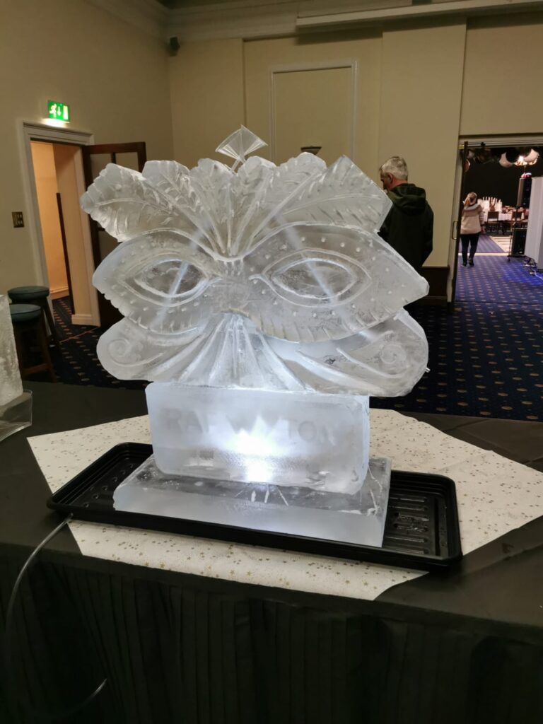 masquerade mask ice sculpture luge