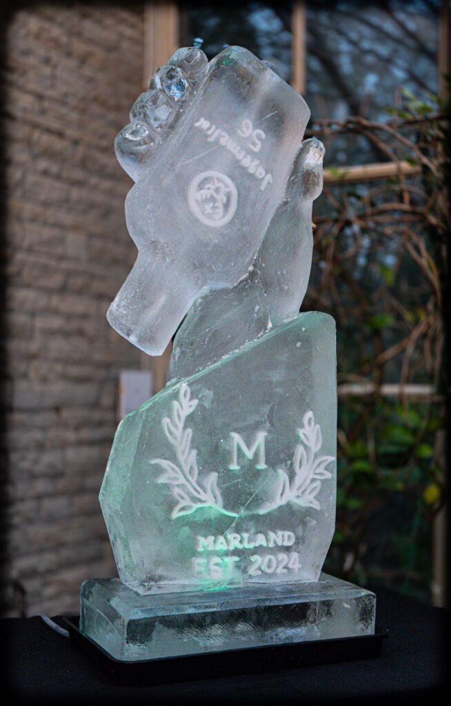 Hand and Bottle ice luge , bottle ice sculpture