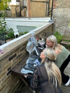 Boobs ice sculpture vodka luge