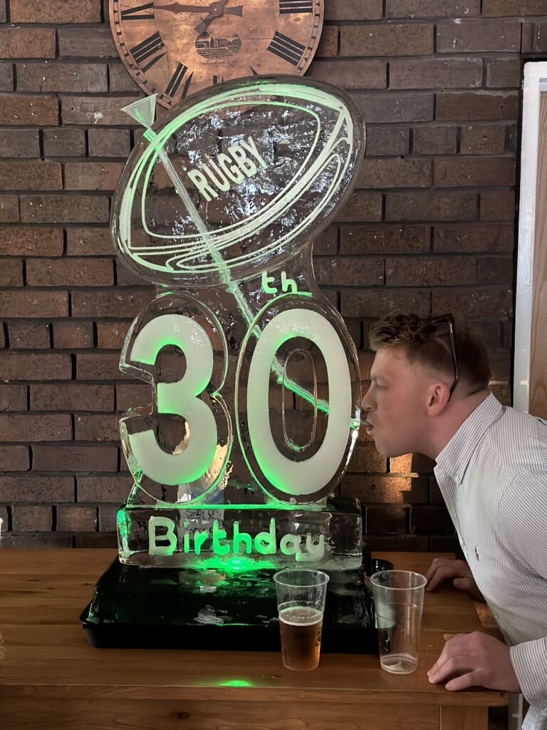Rugby ball ice luge for 30th birthday