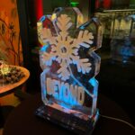 Snowflake ice sculpture vodka luge for Beyond Law Group at Gino D'Acampo Manchester