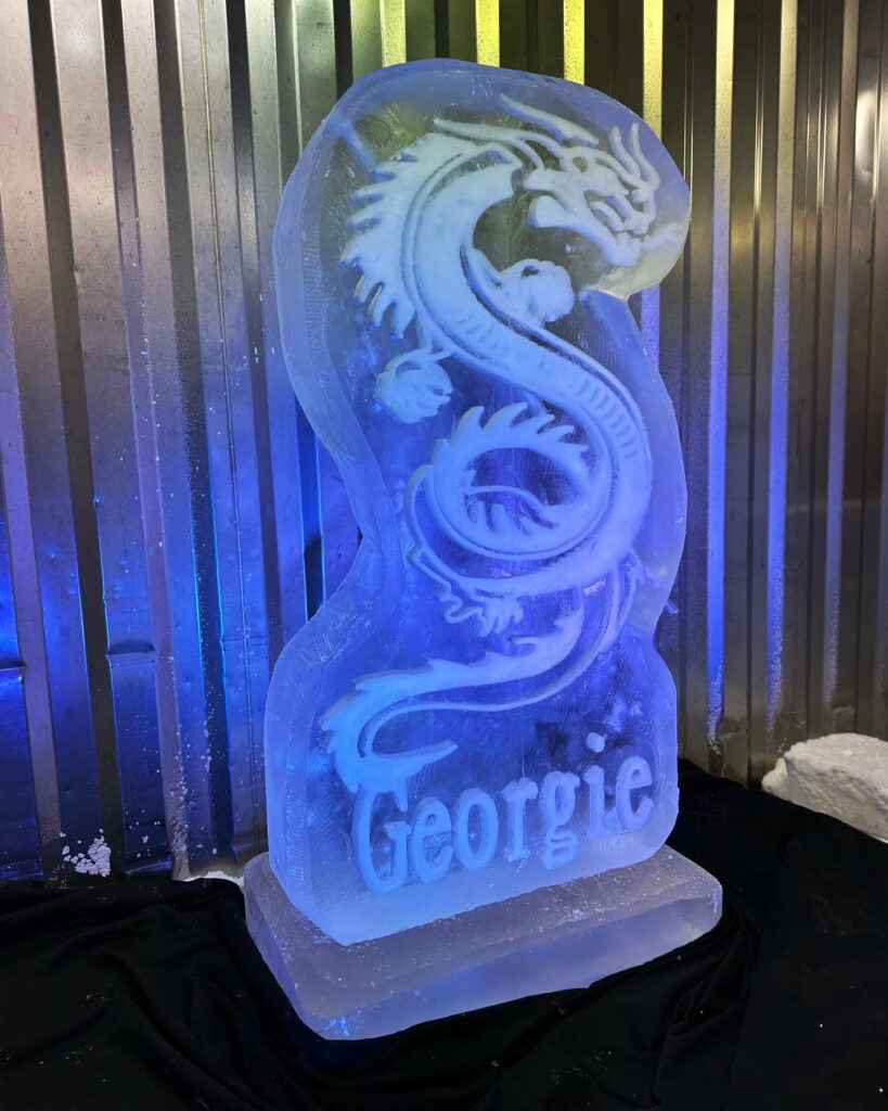 Chinese Dragon ice sculpture Vodka Luge lit blue