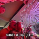 Snowflake vodka luge in use for Christmas Party ideas