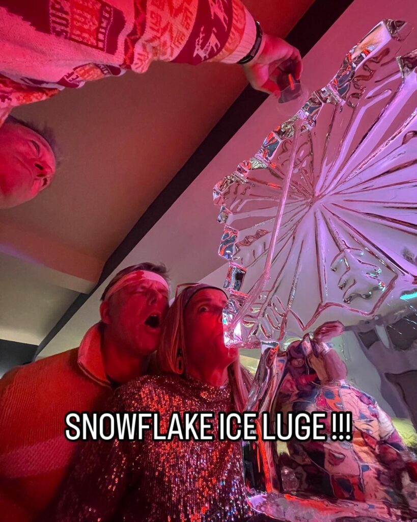 Snowflake vodka luge in use for Christmas Party ideas