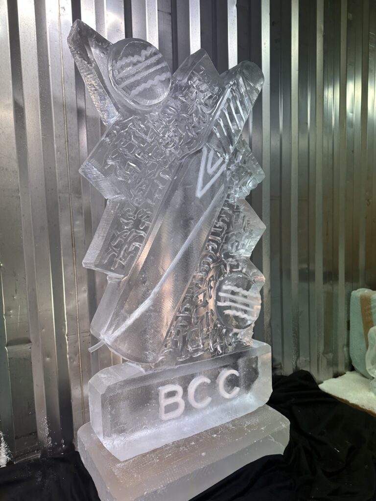 Cricket bat vodka luge - cricket club ice sculpture