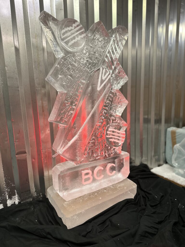 Cricket bat and ball ice vodka luge set up at Surrey Cricket Club